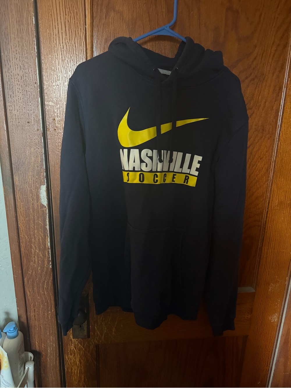 Nike Black Hoodie with Yellow Swoosh and Nashville Soccer Graphic